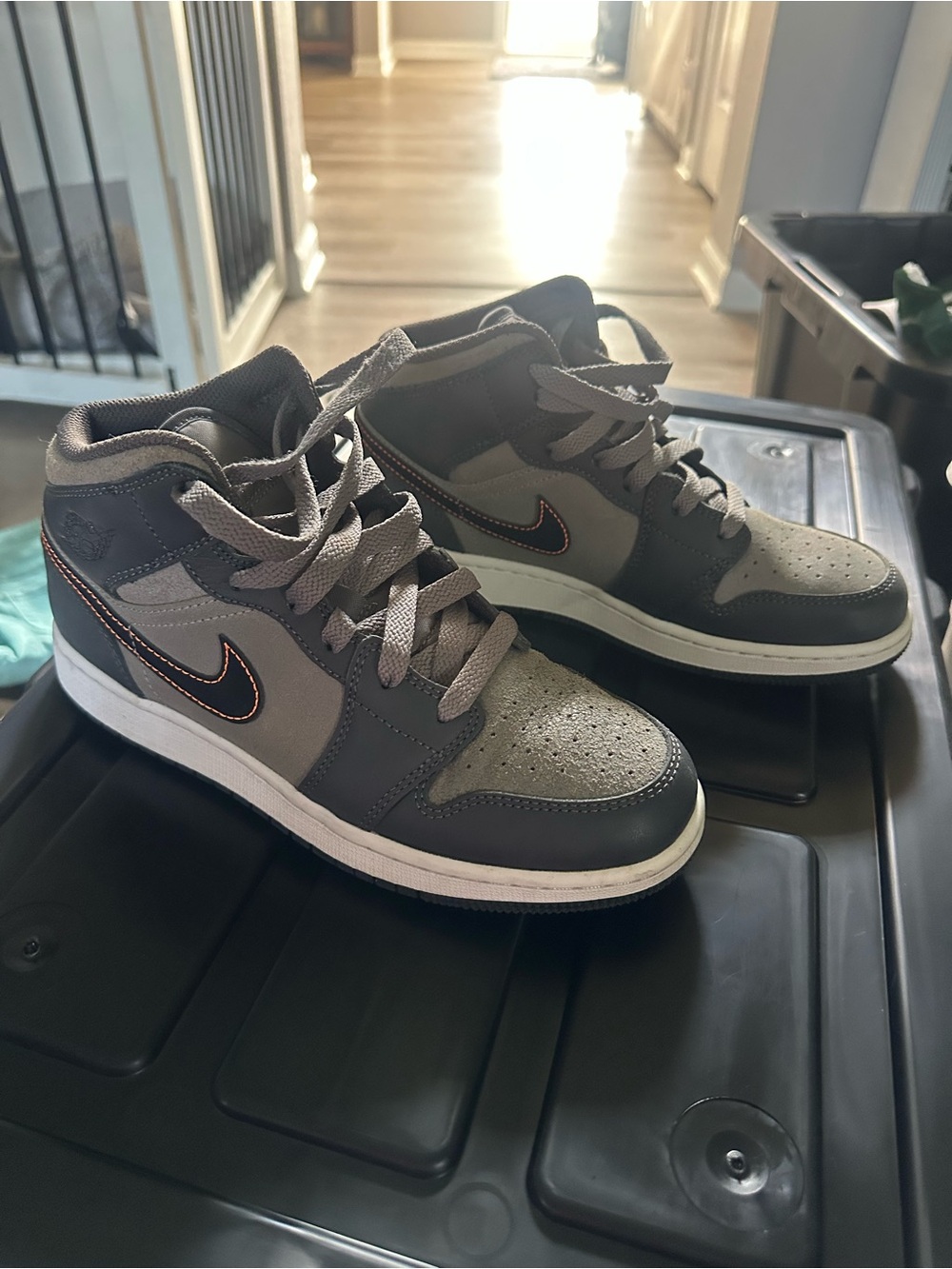 Jordan Mid-Top Athletic Shoes in Gray and Black with Orange Accent